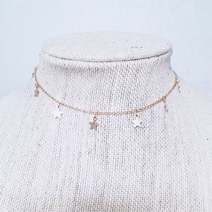 Gold dangle star necklace